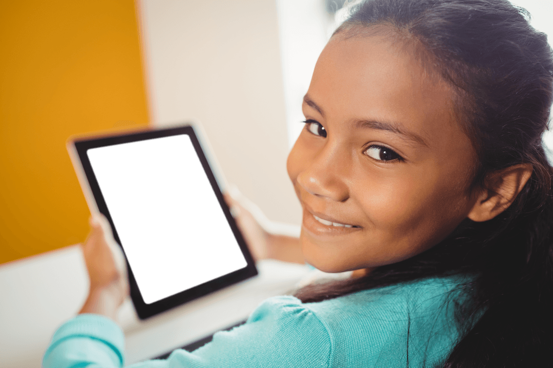 Girl Smiling Holding Transparent Digital Tablet in Classroom