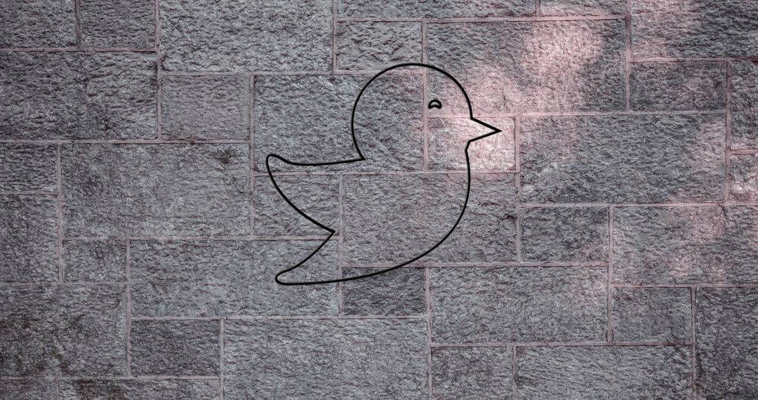 Glowing Neon Bird Icon on Brick Wall - Free Images, Stock Photos and Pictures on Pikwizard.com