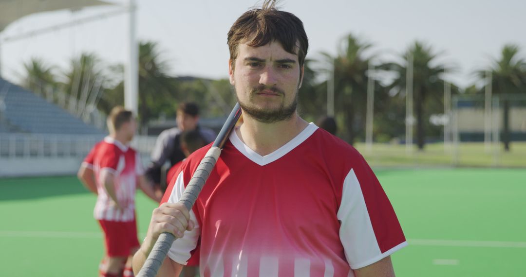 Male Field Hockey Player Holding Stick on Field - Free Images, Stock Photos and Pictures on Pikwizard.com