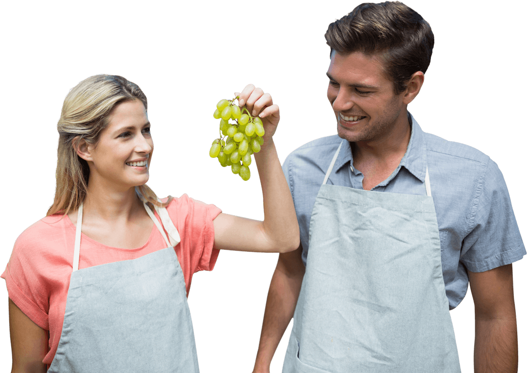 Smiling Couple Holding Grapes on Transparent Background