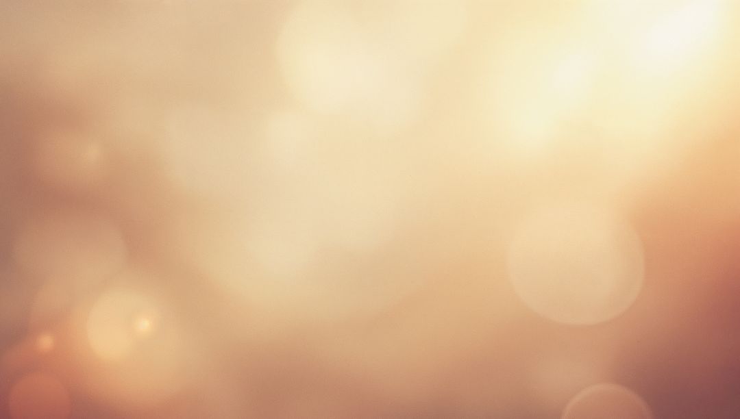 Warm Golden Bokeh Glow with Soft Lens Flare and Abstract Light Halos