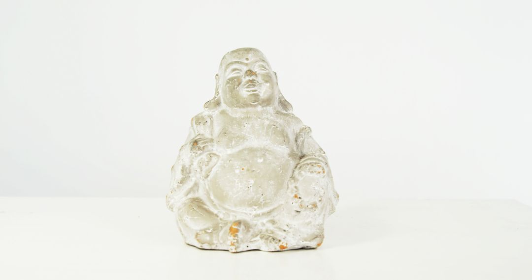 Crystal Laughing Buddha Figurine on White Background - Free Images, Stock Photos and Pictures on Pikwizard.com