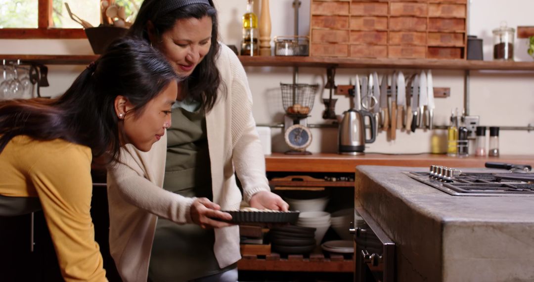 Mother and Daughter Collaborating in Rustic Kitchen