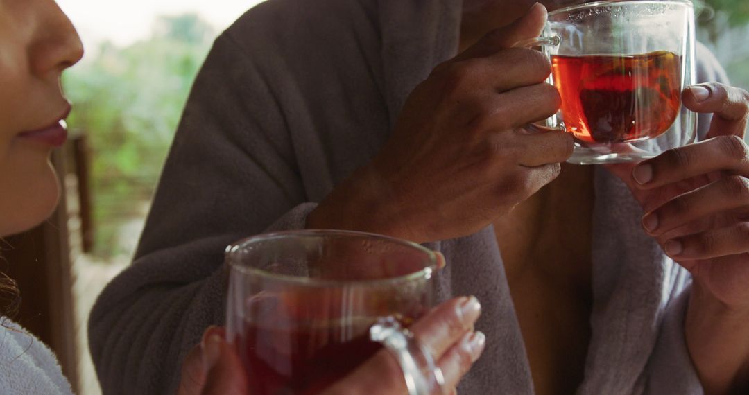 Couple Sipping Hot Tea in Cozy Morning - Free Images, Stock Photos and Pictures on Pikwizard.com