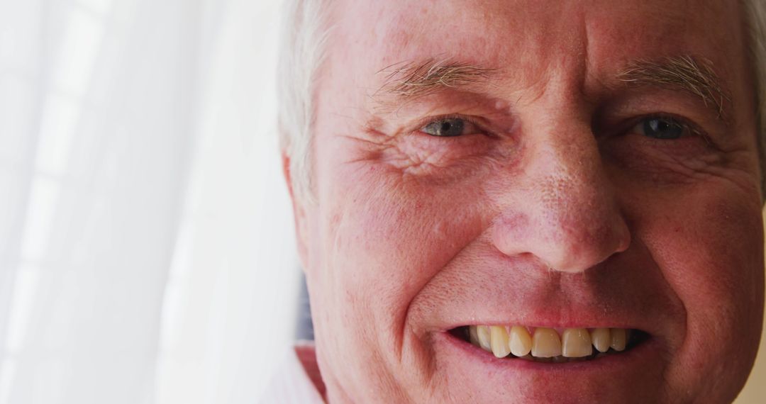 Senior Caucasian Man Smiling at Home