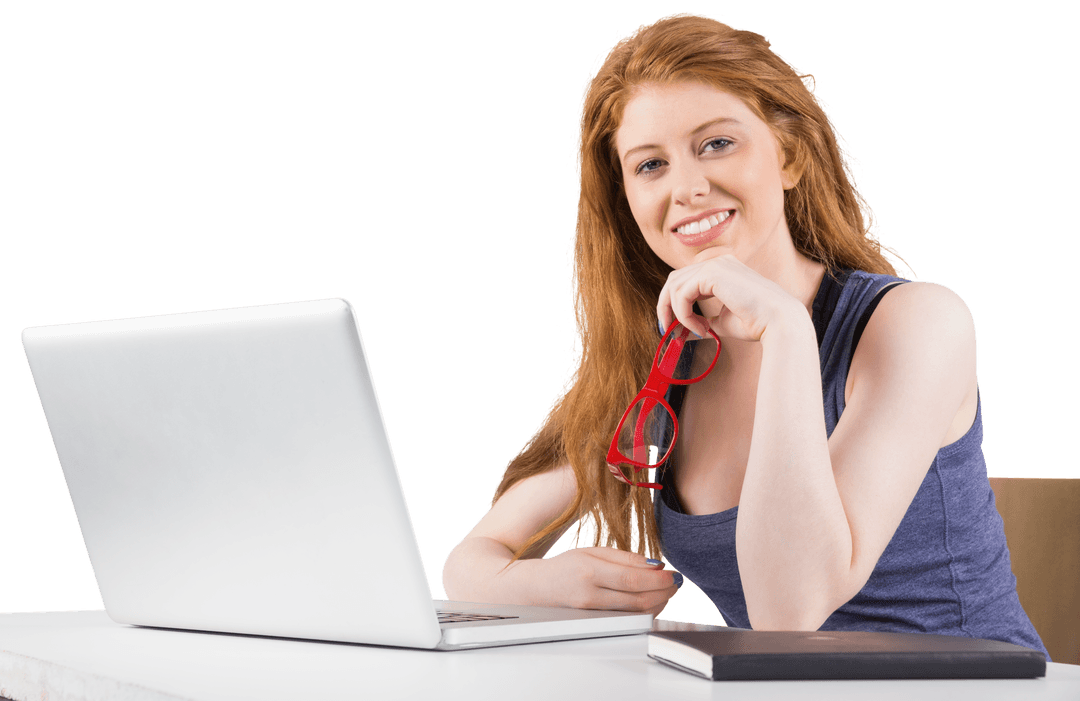 Smiling Redhead Young Woman Using Laptop and Holding Glasses on Transparent Background