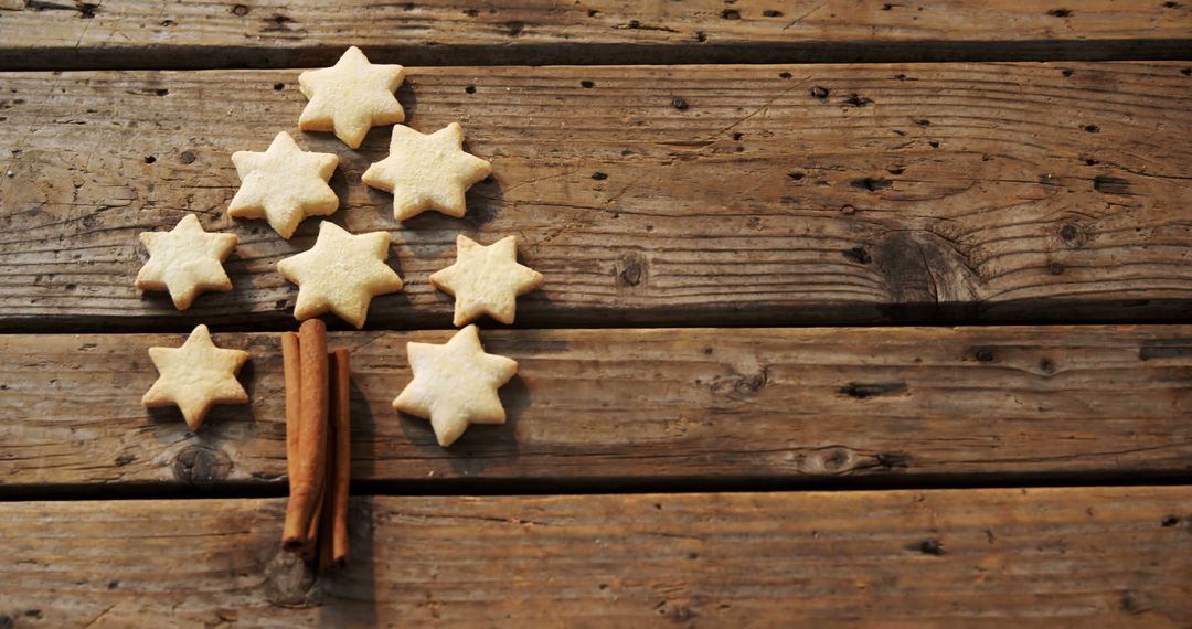 Star Cookies in Christmas Tree Shape on Wooden Background - Free Images, Stock Photos and Pictures on Pikwizard.com