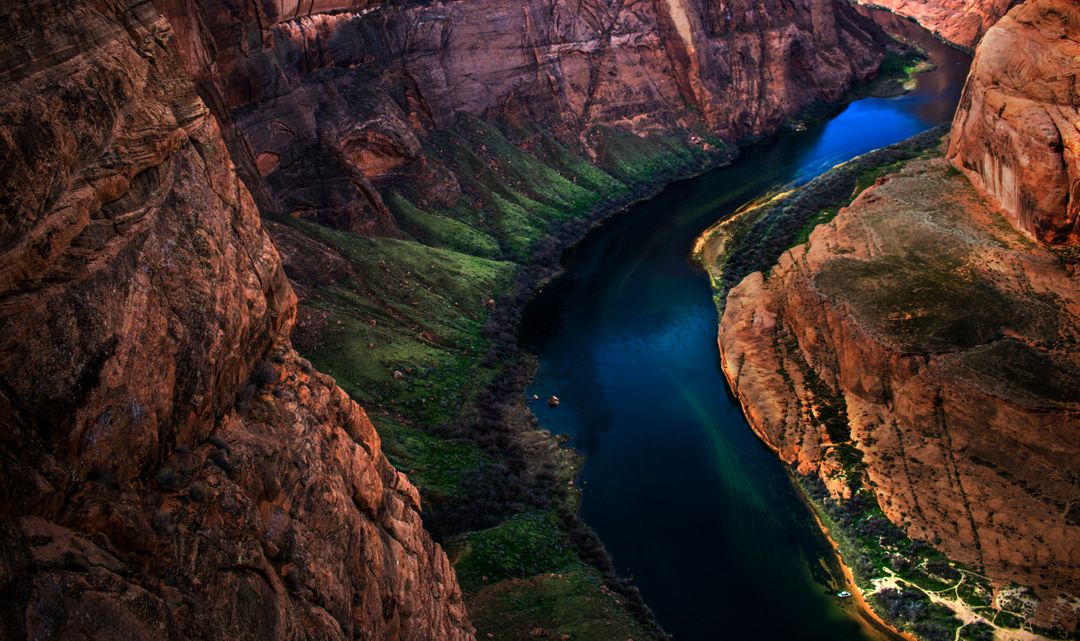 Aerial View of Colorado River Flowing Through Horseshoe Bend Canyon - Free Images, Stock Photos and Pictures on Pikwizard.com