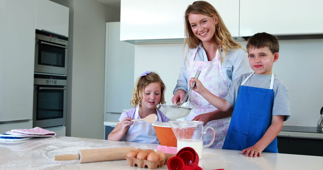 Mother Baking with Her Children in Modern Kitchen - Free Images, Stock Photos and Pictures on Pikwizard.com