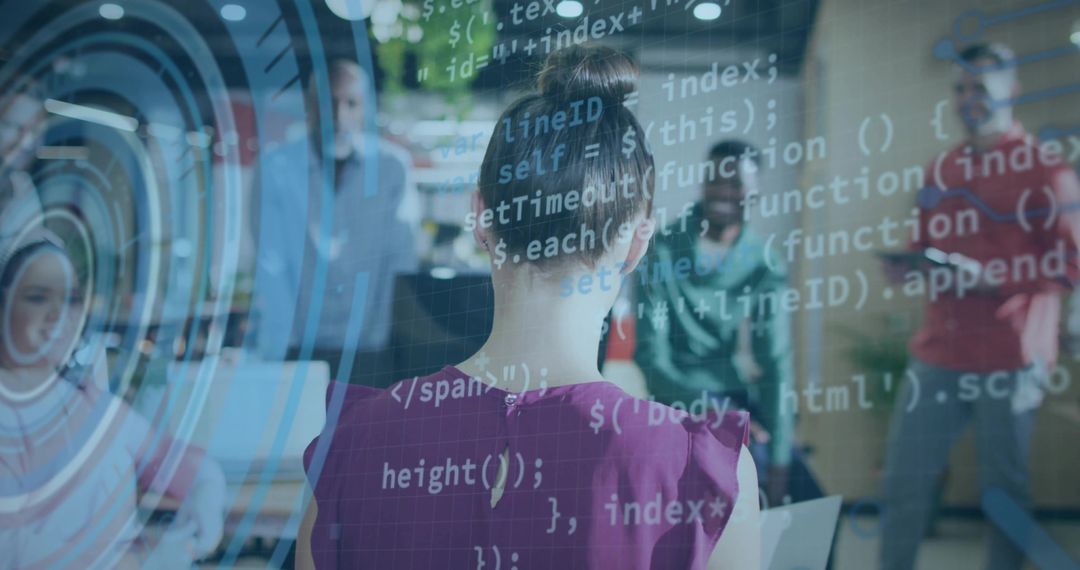 Developer Typing Code with Colleagues in Innovative Office