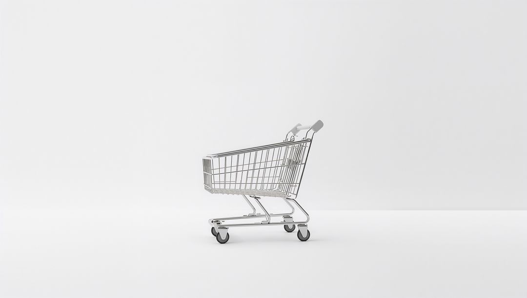 Chrome shopping cart sitting on white high-key minimal background for retail concept