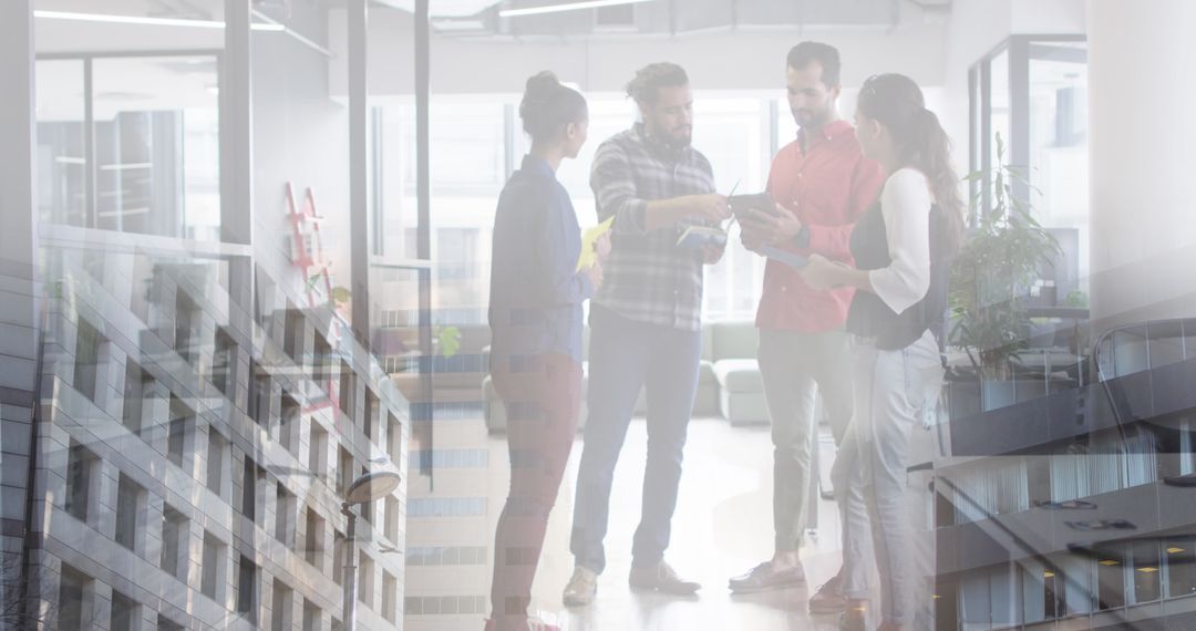 Diverse Team Collaborating with Modern Cityscape Overlay