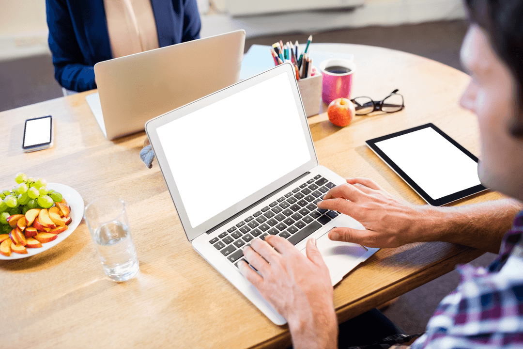 Transparent Laptop and Digital Devices on Wooden Desk