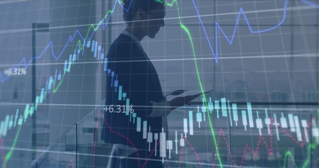 Entrepreneur Analyzing Stock Market Data with Tablet Device