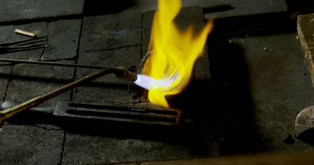 Close-Up of Metalworking Torch Heating Material in Workshop - Free Images, Stock Photos and Pictures on Pikwizard.com