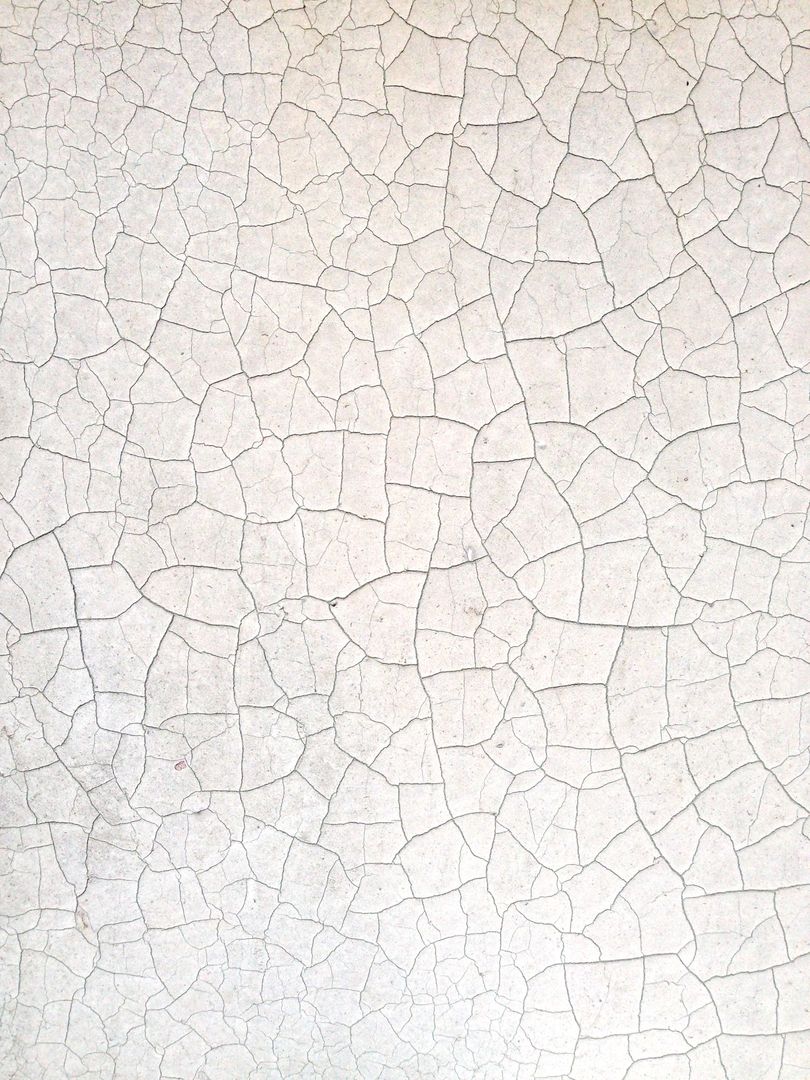 Close-Up of Cracked White Paint Texture on a Wall Surface - Free Images, Stock Photos and Pictures on Pikwizard.com
