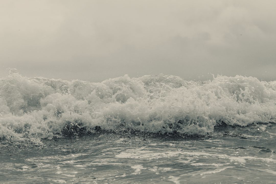 Rough Ocean Waves Crashing on a Cloudy Day - Free Images, Stock Photos and Pictures on Pikwizard.com