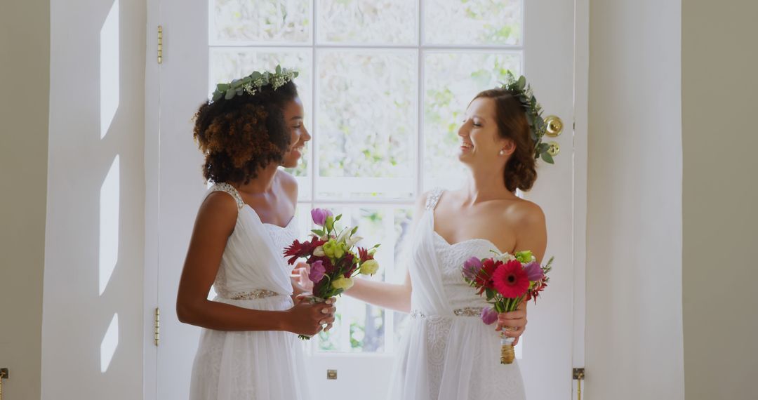 Bride and Bridesmaid Sharing Joy, Bright Natural Light - Free Images, Stock Photos and Pictures on Pikwizard.com