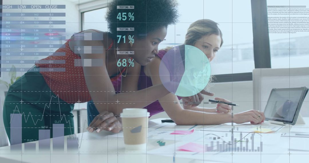 Businesswomen Analyzing Digital Financial Data Representation