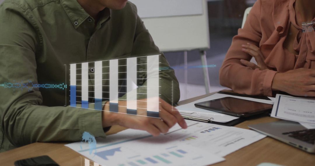 Business Team Engaging in Data Analysis with Modern Technology Overlay