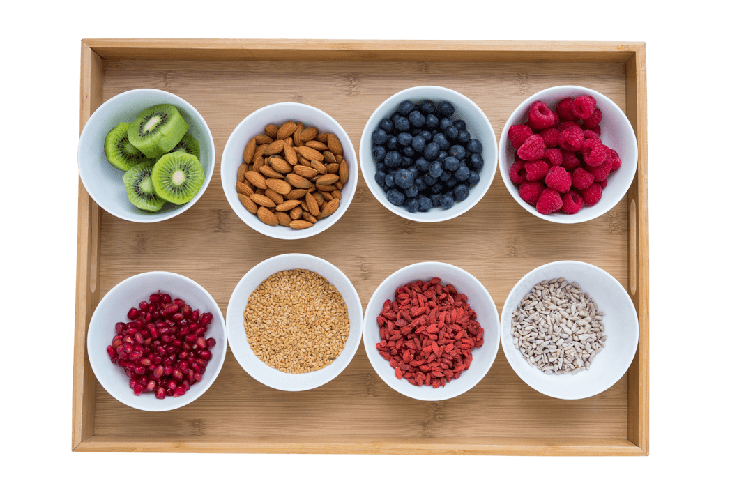 Assortment of Fresh Fruits and Nuts in Transparent Bowls