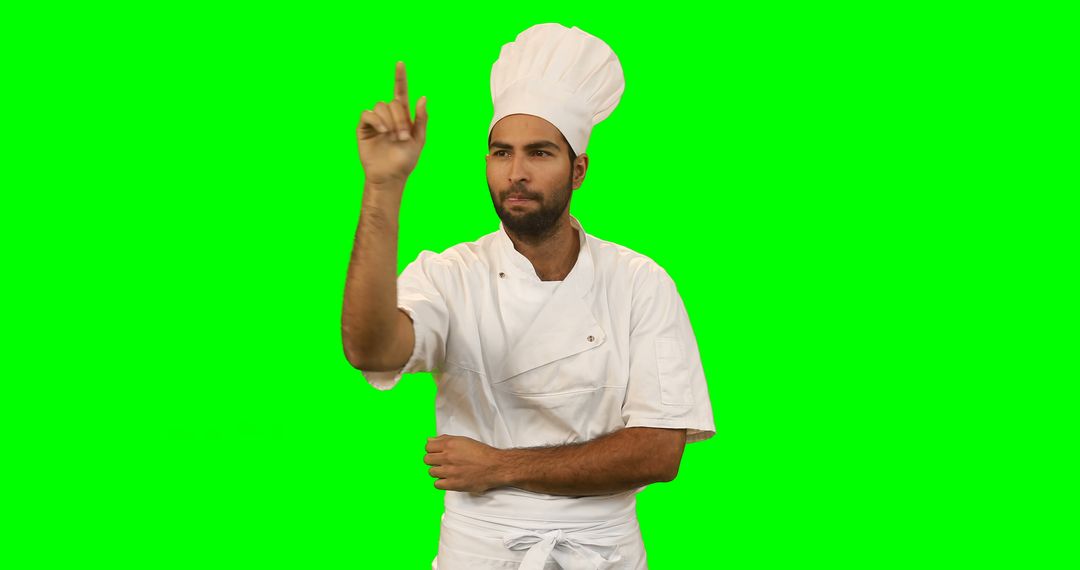 Chef touching invisible screen against green screen - Free Images, Stock Photos and Pictures on Pikwizard.com