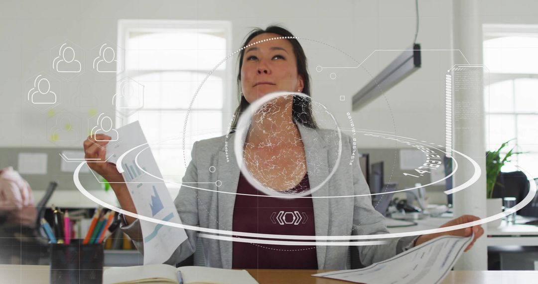Woman Analyzing Data in Modern Office with Futuristic Graphics