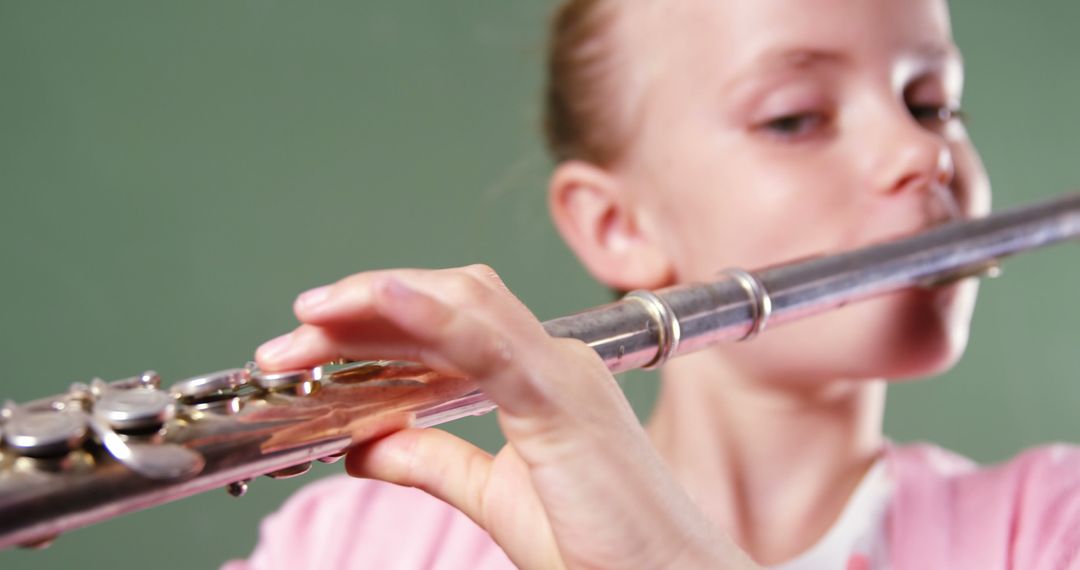 Young Musician Playing Flute Close Up - Free Images, Stock Photos and Pictures on Pikwizard.com