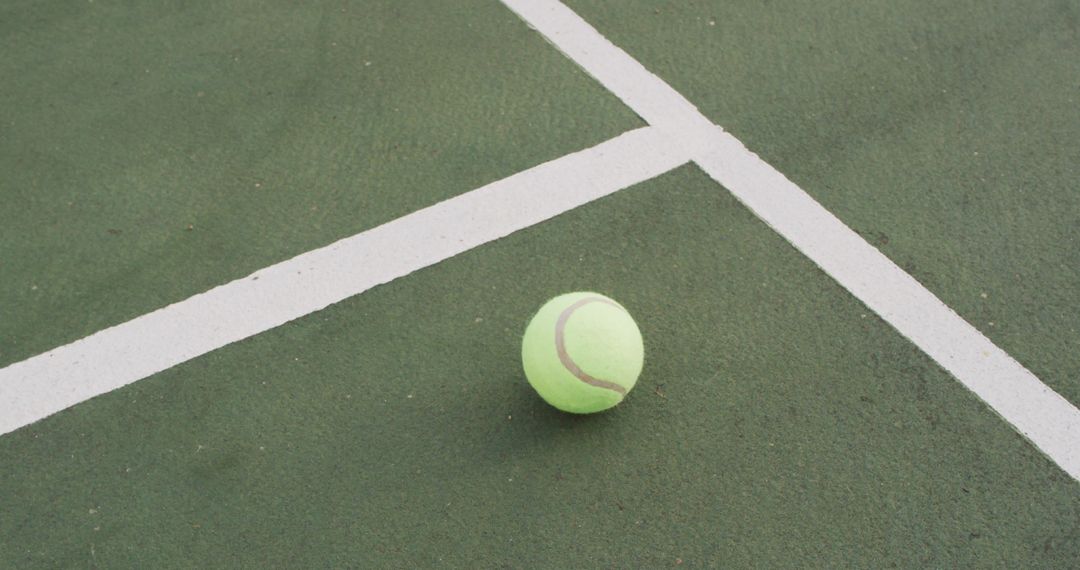 Tennis Ball on Tennis Court with White Lines Highlighting Boundaries - Free Images, Stock Photos and Pictures on Pikwizard.com