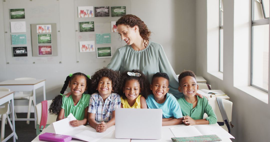 Image of happy caucasian female teacher and class of diverse pupils smiling at camera - Free Images, Stock Photos and Pictures on Pikwizard.com