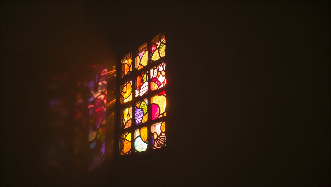 Abstract Stained Glass Window Casting Colorful Reflections