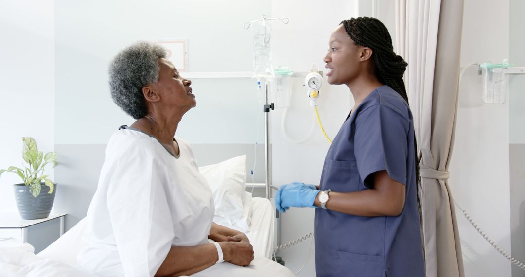 Nurse Checking on Elderly Patient in Hospital Room - Free Images, Stock Photos and Pictures on Pikwizard.com