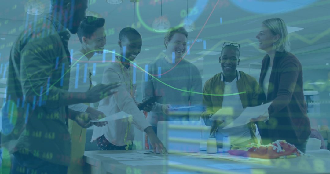 Diverse Business Team Collaborating Over Project in Modern Office Space