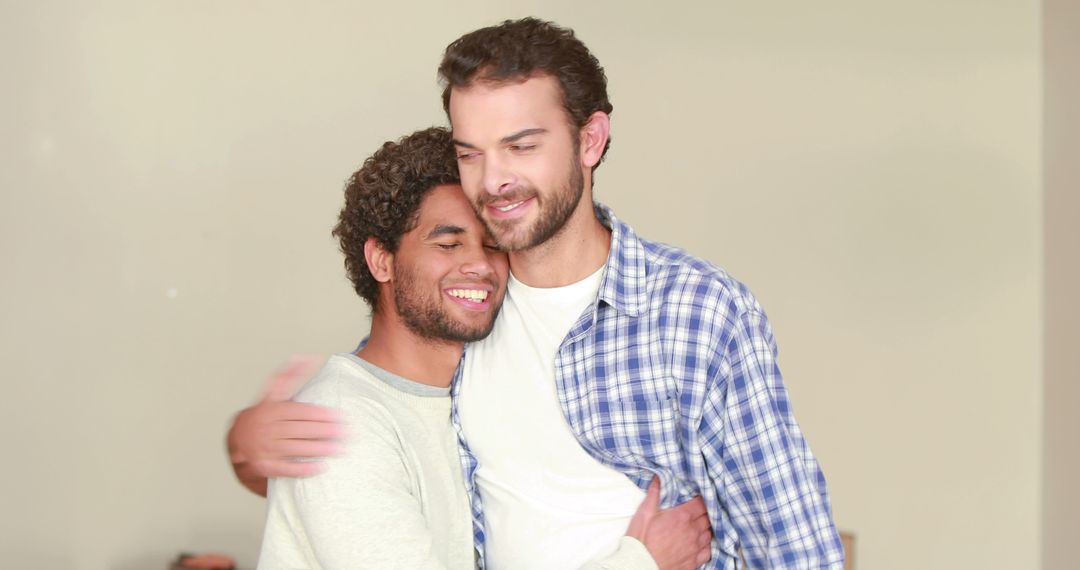 Young Men Embracing, Showing Friendship and Connection