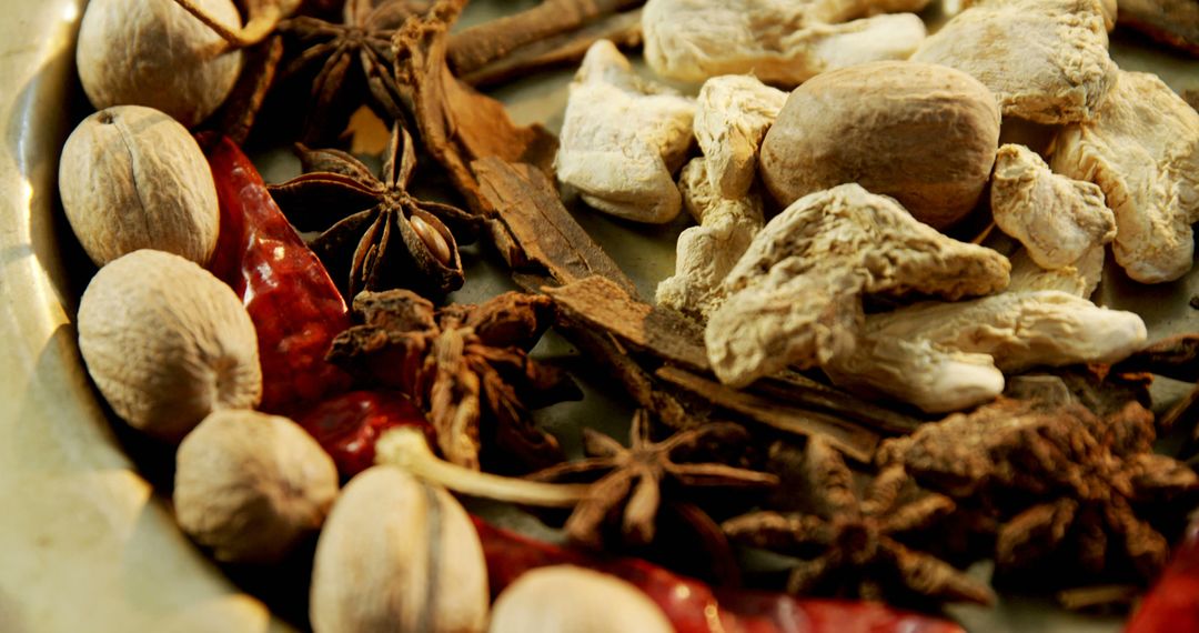 Close-Up of Various Dried Spices on Plate for Cooking and Decoration - Free Images, Stock Photos and Pictures on Pikwizard.com