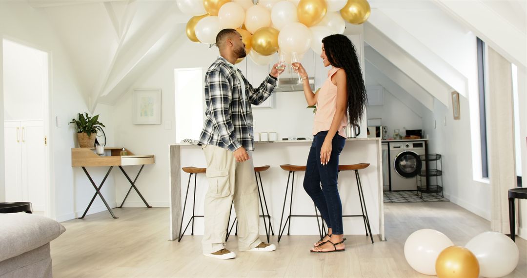 Couple Enjoying Post-Party Cleanup in Modern Home Interior