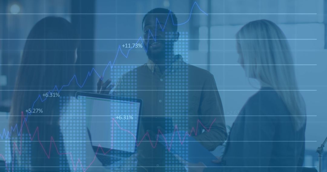 Diverse Team Analyzing Business Data Trends in Modern Office