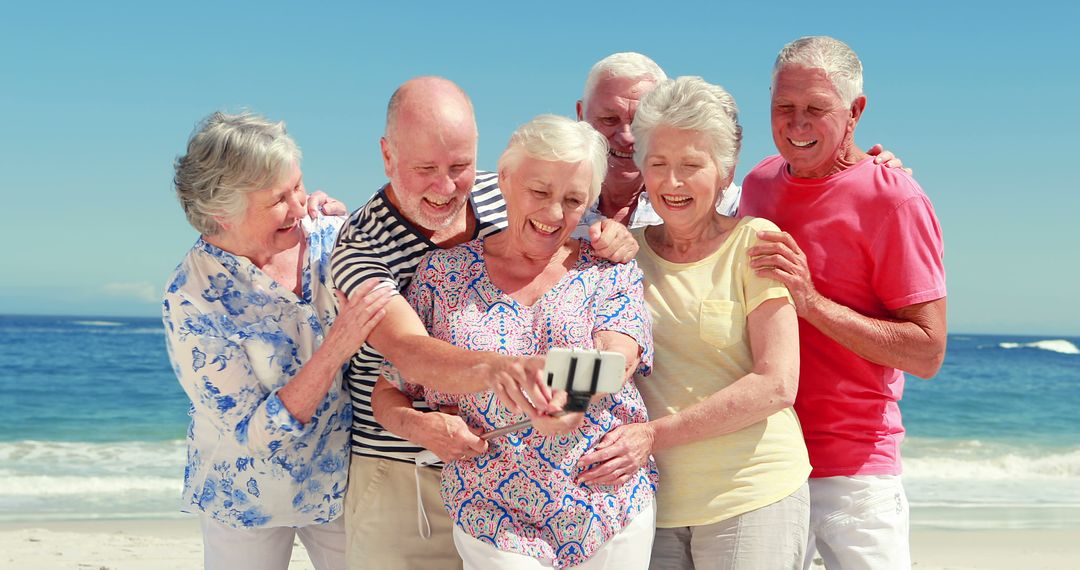 Happy Senior Friends Taking Selfie on Sunny Beach - Free Images, Stock Photos and Pictures on Pikwizard.com