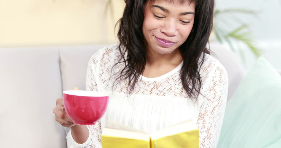 Woman Enjoying Leisure Time with Book and Coffee - Free Images, Stock Photos and Pictures on Pikwizard.com