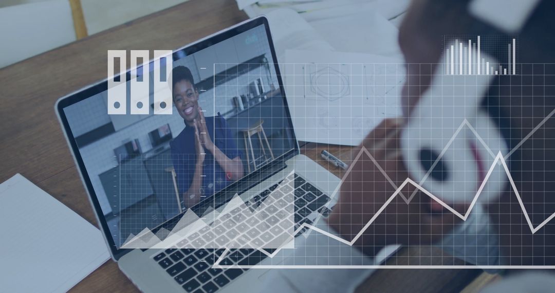Virtual Meeting with Graph Overlay on Laptop Screen