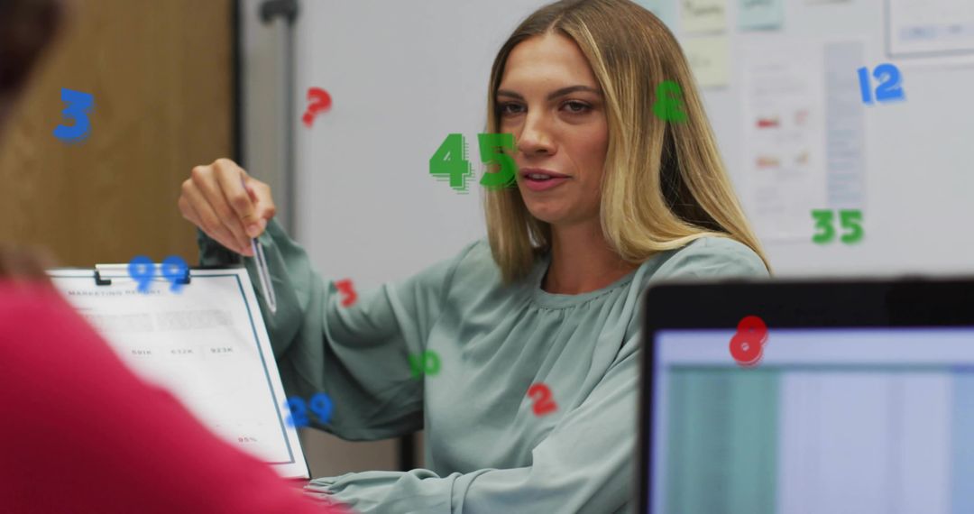 Team Leader Pointing at Report During Planning Meeting with Numeric Data Overlays