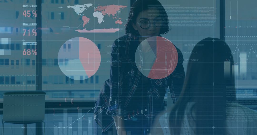 Businesswomen Analyzing Data Dashboard for Strategic Planning