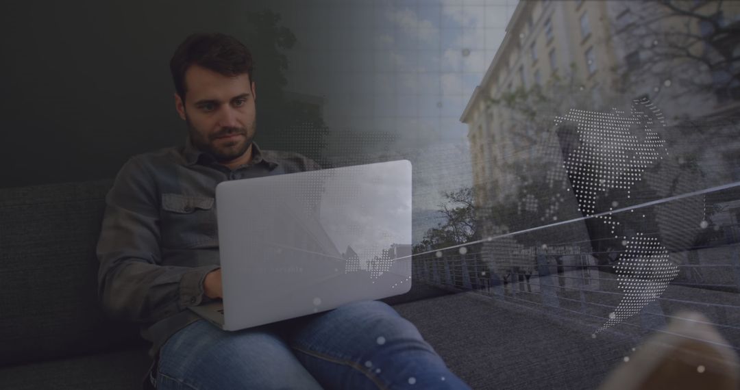 Businessman Conducting Online Work with Global Data Overlay