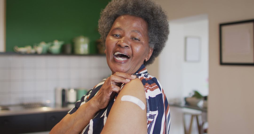 African American Senior Woman Showing Arm with Bandage and Smiling - Free Images, Stock Photos and Pictures on Pikwizard.com