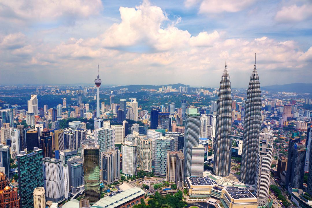 Aerial View of Kuala Lumpur Cityscape with Petronas Towers - Free Images, Stock Photos and Pictures on Pikwizard.com
