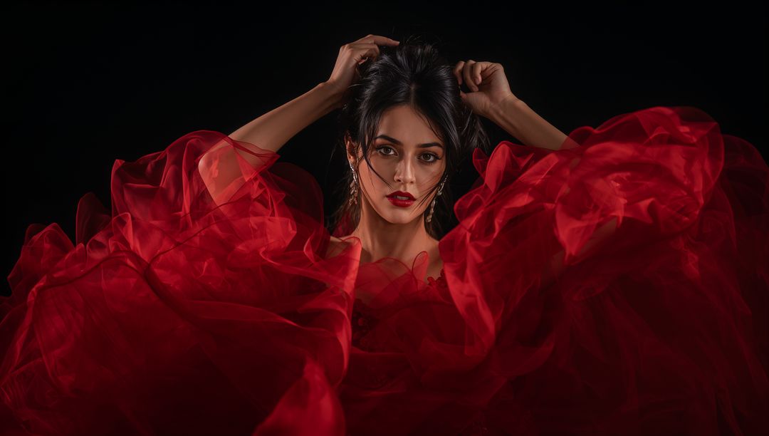 Stunning Woman in Flowing Red Chiffon Gown with Elegant Posing
