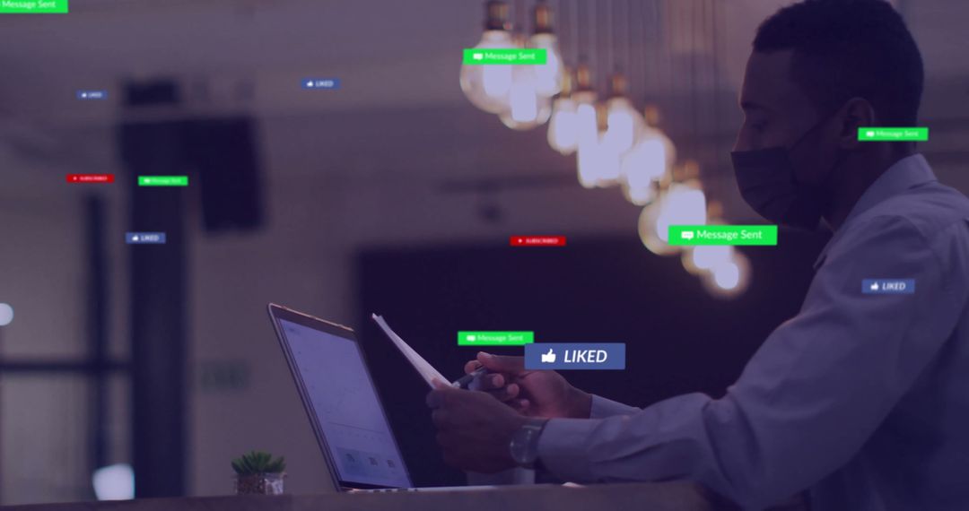 Tech-savvy Businessman Engaging with Social Media on Laptop