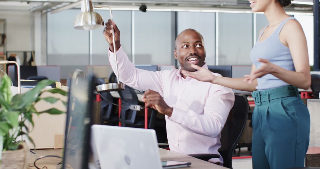 Engaged Coworkers Discussing Ideas in Modern Office