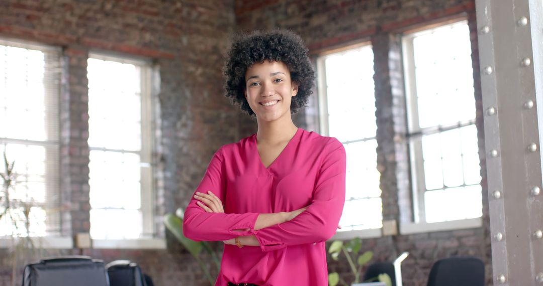 Confident Black Woman Smiling in Modern Office - Free Images, Stock Photos and Pictures on Pikwizard.com