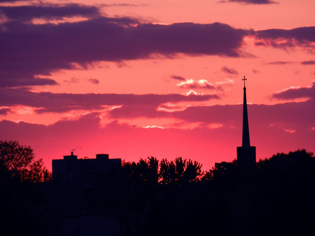 Silhouette of Church Steeple Against Vibrant Sunset Sky - Free Images, Stock Photos and Pictures on Pikwizard.com